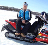 Linda on snow scooter